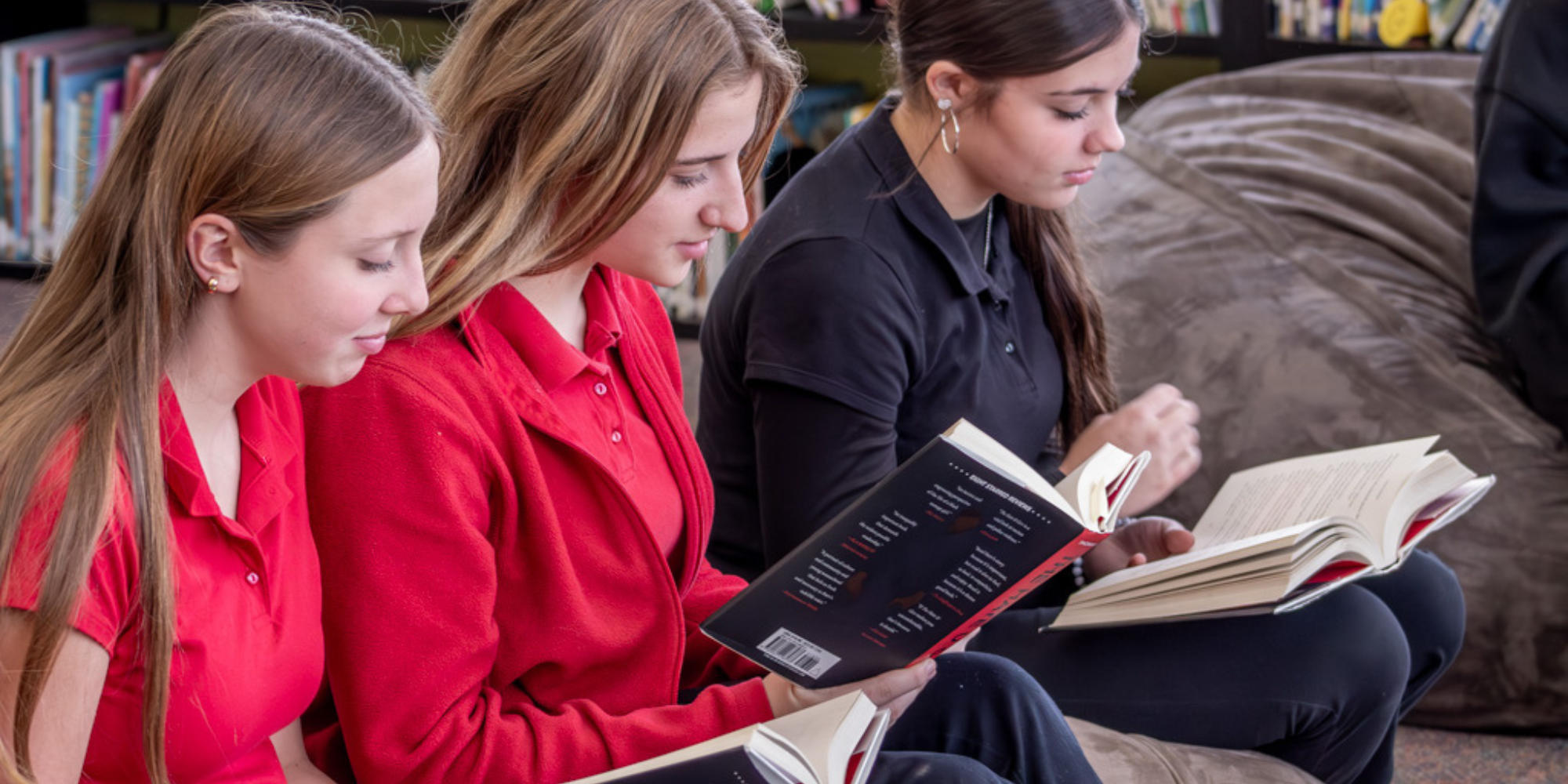 SBS students reading in the library