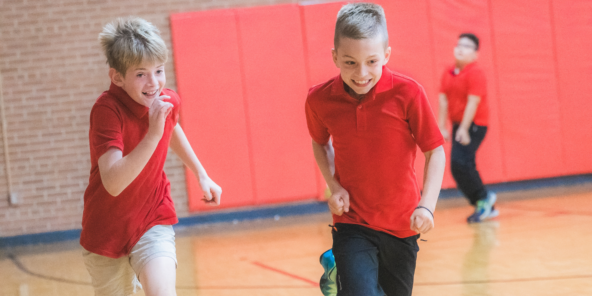 SBS students playing in gym